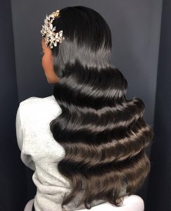 Beautiful beach wave hairstyle by Salon Owner and Key Artist Katie D'Souza. Find out what she is up to at LuvlyLongLocks.com.